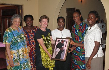 Kathy Gibbons Director of Marketing, African Province, Society of the Holy Child Jesus, presenting the Holy Child Sisters in Oghara, Delta State, Nigeria, a framed reproduction of Jesus of the People for their school, Our Lady of Nigeria.